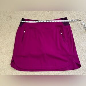 Athleta Fairway Golf Skort two tone magenta with multiple pockets